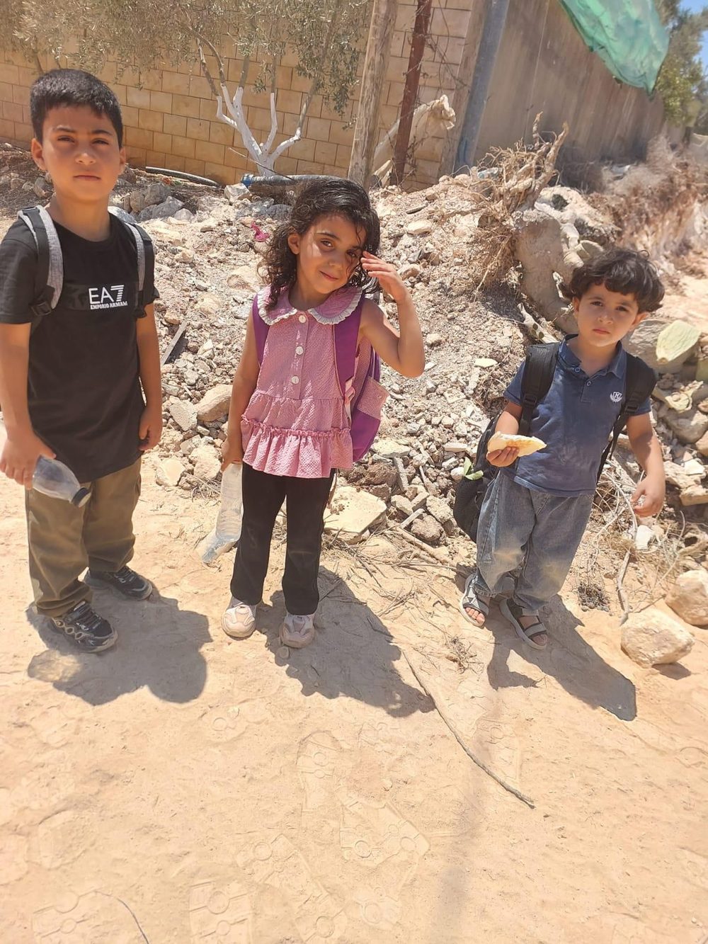 Displaced children outdoors