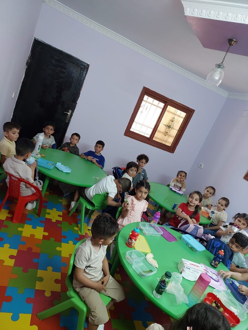 Children learning in the new Al Tafawk classroom